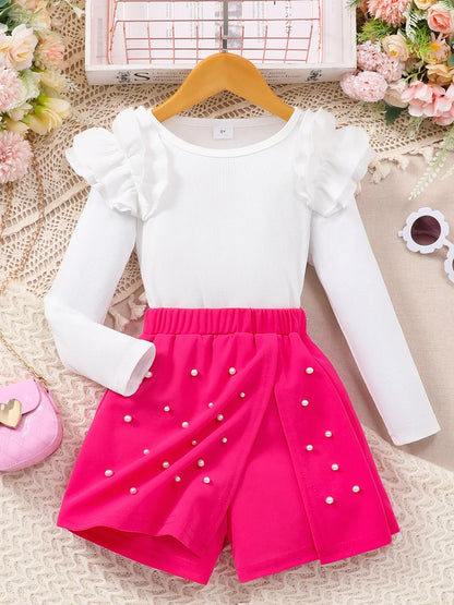Girl's neat color long sleeved round neck, elastic waist skirt pants set.
