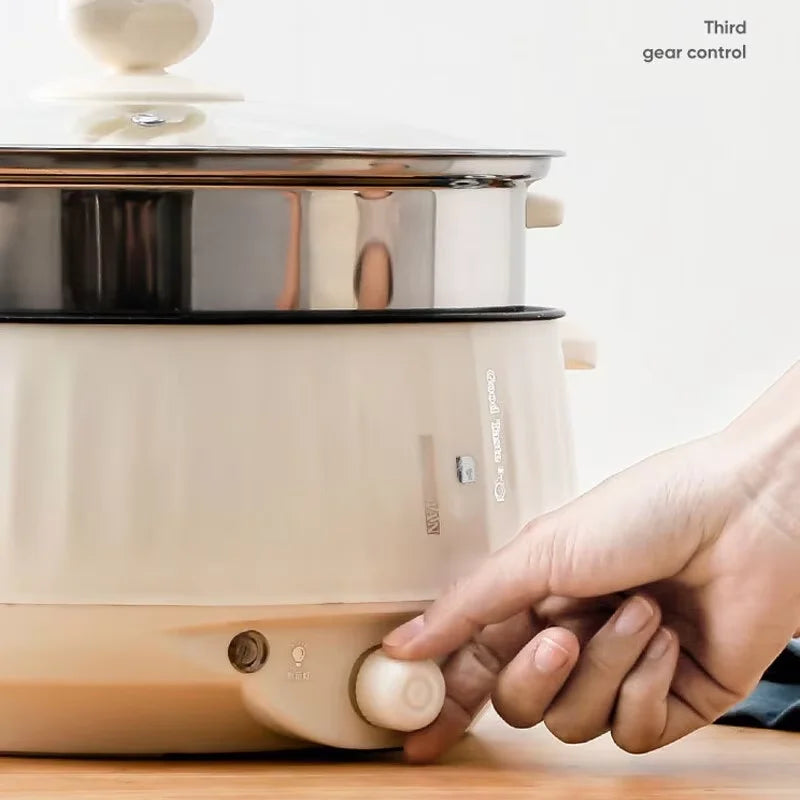 Electric cooking pot integrated multi-functional electric rice cooker.