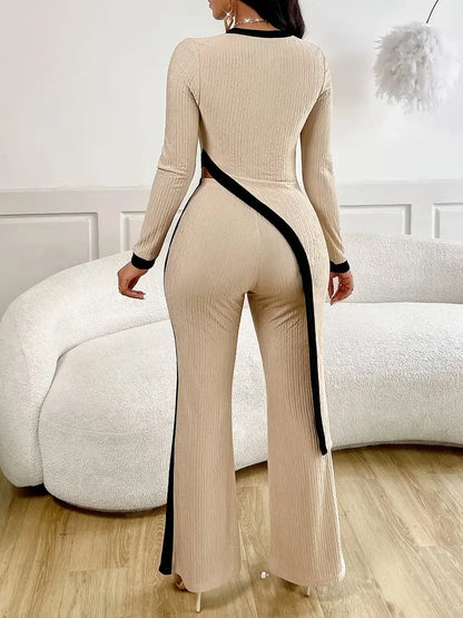 Elegant women's tight fitting asymmetrical hem pants top set for women.