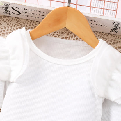 Girl's neat color long sleeved round neck, elastic waist skirt pants set.