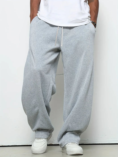 Men heavy breathable sports jogging pants, elastic drawstring waist loose casual trousers.