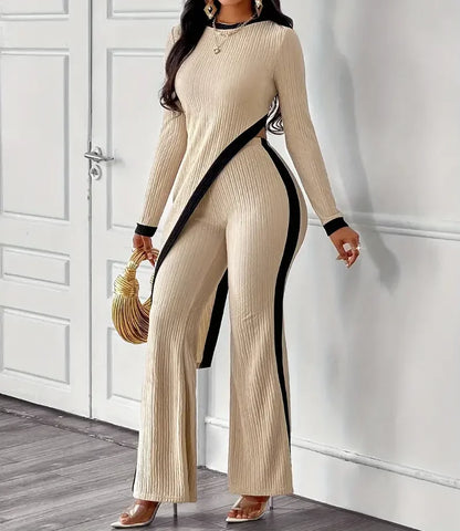 Elegant women's tight fitting asymmetrical hem pants top set for women.
